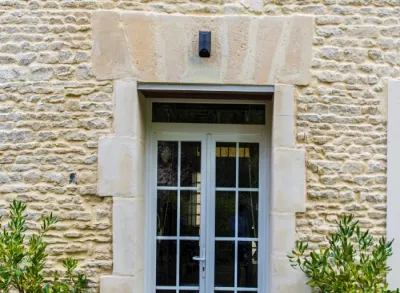 Finition et protection de la façade en pierre à Le Breuil-en-Bessin